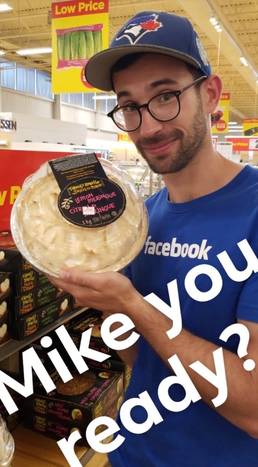 Mike holding a lemon meringue pie