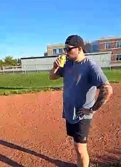 Dan drinking during the beer mile